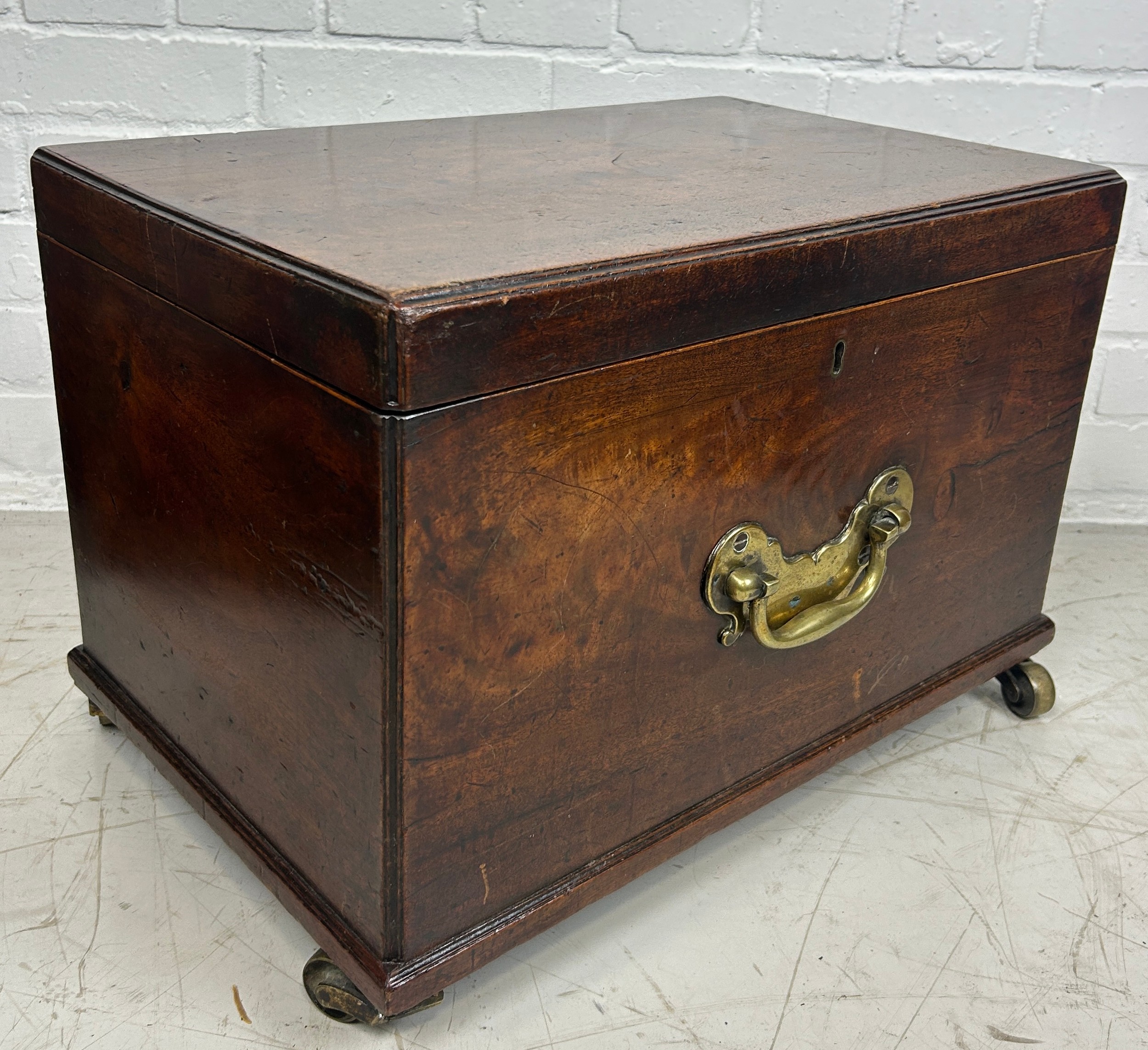 A GEORGE III MAHOGANY CELLARETTE, With fitted interior, brass handles and brass castors. 54cm x 38cm - Image 3 of 4