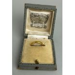 A 22CT GOLD WEDDING BAND, Weigh 2.6gms In antique box.