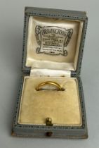 A 22CT GOLD WEDDING BAND, Weigh 2.6gms In antique box.