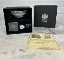 TEK SING CARGO: A BLUE AND WHITE BOWL AND BRONZE CURRENCY IN BOX