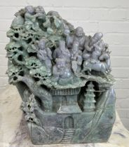 A LARGE AND EXCEPTIONALLY HEAVY CHINESE GREEN AND PURPLE JADE SCULPTURE DEPICTING SEVERAL FIGURES