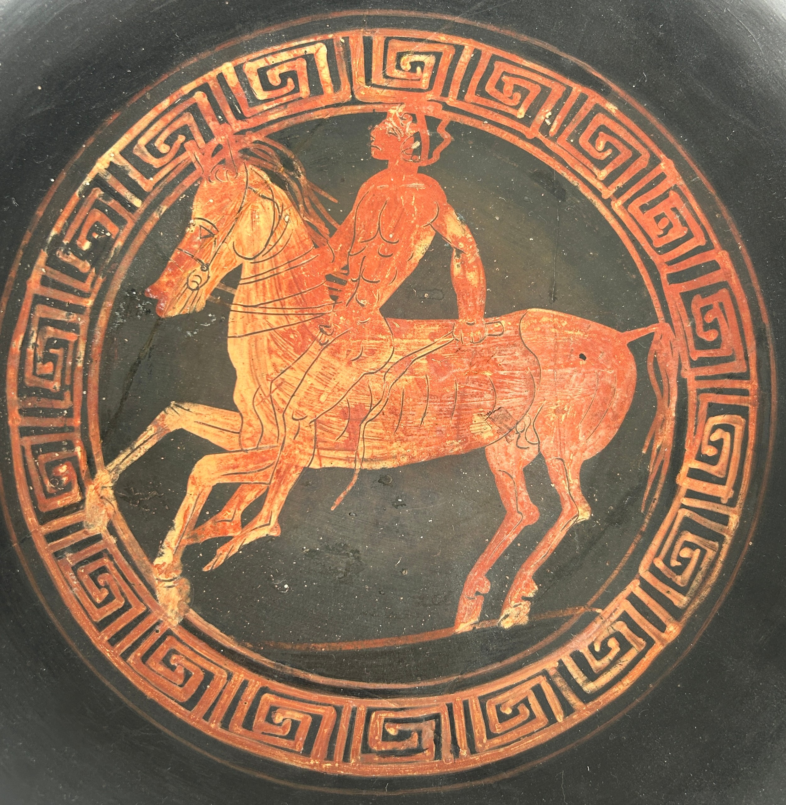 AN APULIAN POTTERY KYLIX DECORATED WITH A HORSE AND RIDER CIRCA 5TH CENTURY B.C. - Image 2 of 10