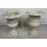 A PAIR OF WHITE PAINTED CAST IRON GARDEN URNS, 32cm H each