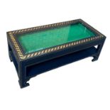A DESIGNER COFFEE TABLE WITH GLASS INSERT AND GOLD GREEK KEY BORDER, 114cm x 53cm x 42cm