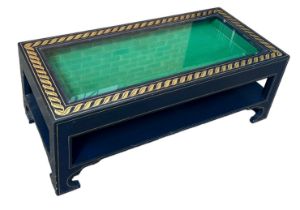 A DESIGNER COFFEE TABLE WITH GLASS INSERT AND GOLD GREEK KEY BORDER, 114cm x 53cm x 42cm