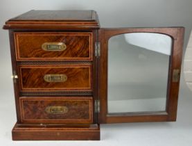 A 19TH CENTURY ROSEWOOD TABLE TOP CABINET WITH GLAZED FRONT AND THREE DRAWERS WITH CAMPAIGN HANDLES