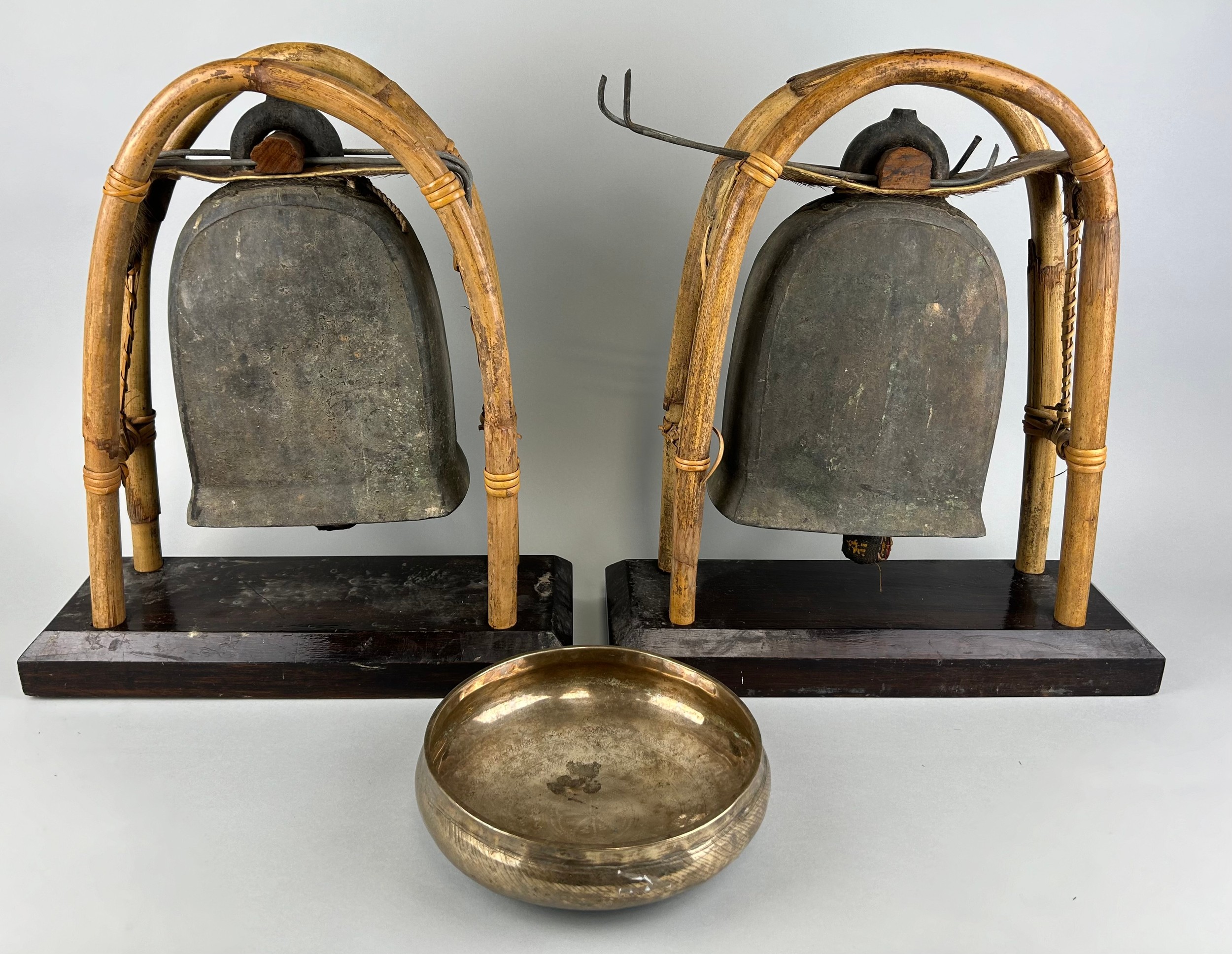 A PAIR OF BUDDHIST BRONZE ELEPHANT BELLS OR GONGS AND A SINGING BOWL (3), Each gong 43cm x 38cm - Image 2 of 5