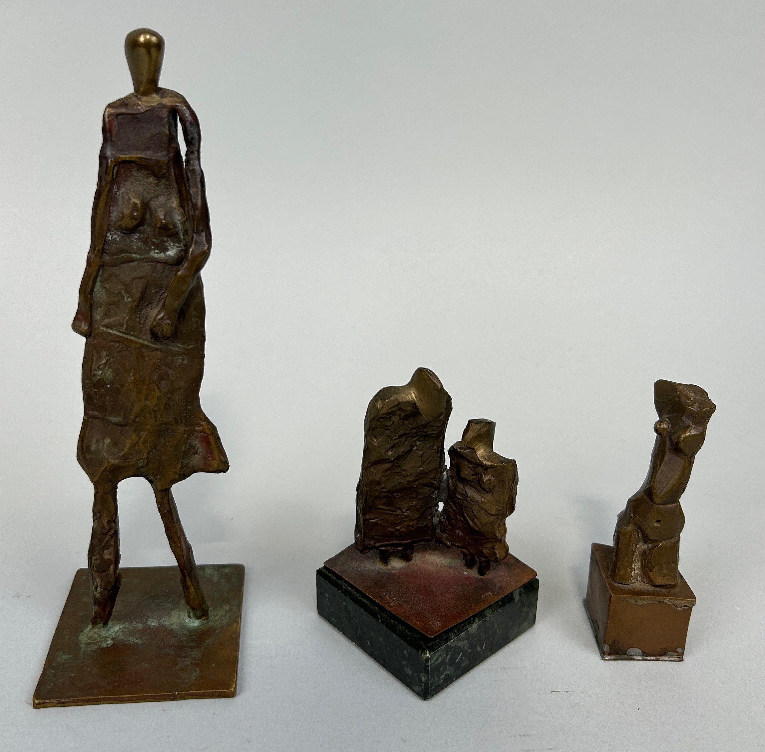 AFTER HENRY MOORE: A SET OF THREE MODERNIST BRONZE SCULPTURES, Signed to verso. Tallest 21cm