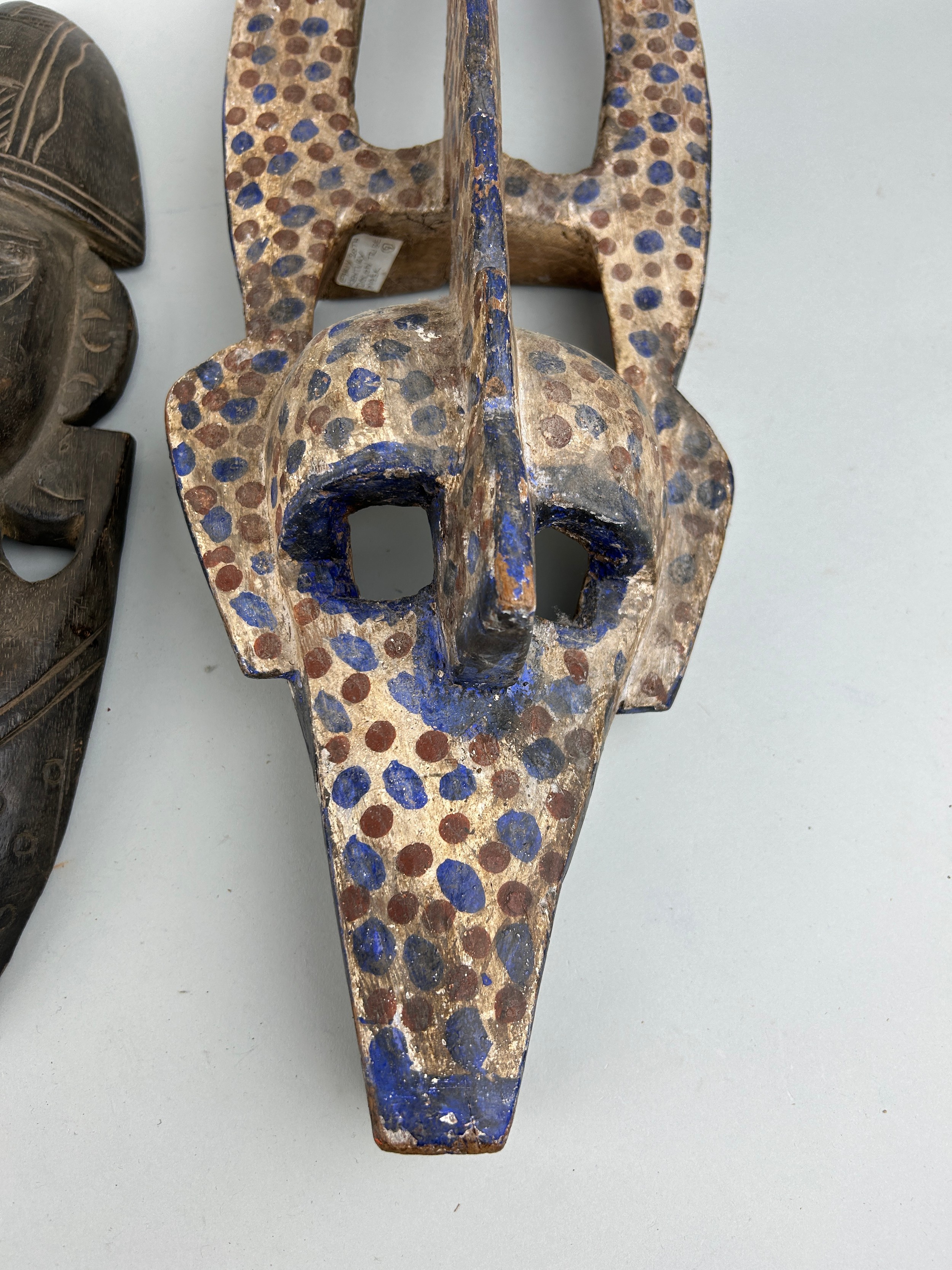 A GROUP OF FOUR AFRICAN TRIBAL MASKS (4), One labelled 'early 20th Century Dogon tribe mask' (56cm x - Image 2 of 3