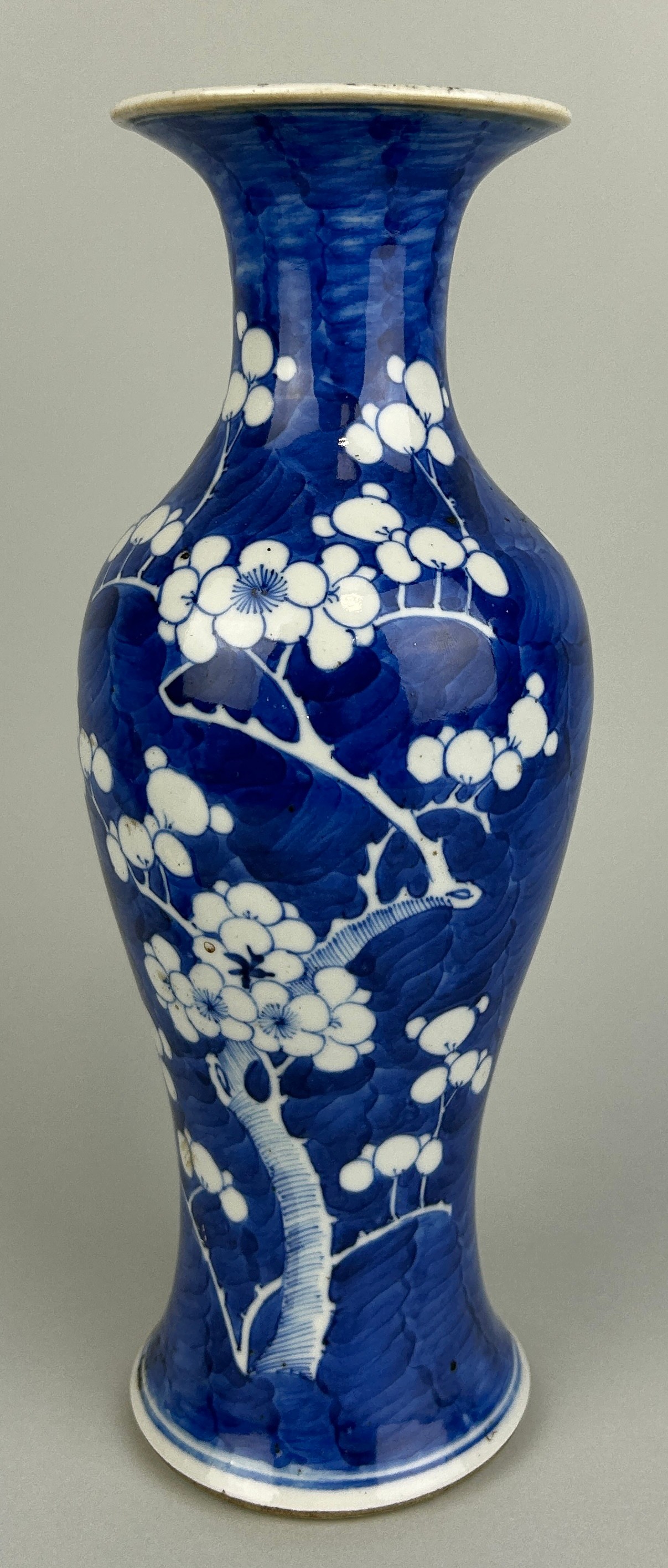 A 19TH CENTURY CHINESE BLUE AND WHITE PRUNUS VASE, 29cm H Drilled for lamp.