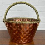 AN ARTS AND CRAFTS COPPER BASKET WITH ROPE TWIST HANDLES 34cm x 32cm