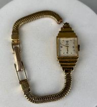 AN OMEGA GOLD LADIES WRISTWATCH, Weight 26gms