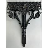 AN EBONISED WOODEN WALL SHELF WITH ELEPHANT, 52cm x 40cm Ivory exemption license: VF1XCS3L