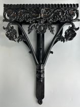 AN EBONISED WOODEN WALL SHELF WITH ELEPHANT, 52cm x 40cm Ivory exemption license: VF1XCS3L