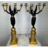 A PAIR OF FRENCH EMPIRE DESIGN EARLY 20TH CENTURY GILT AND BRONZE FOUR-LIGHT CANDELABRA IN THE