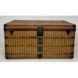 A 19TH CENTURY LOUIS VUITTON TRUNK CIRCA 1885, Brown striped design with leather details and green