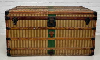 A 19TH CENTURY LOUIS VUITTON TRUNK CIRCA 1885, Brown striped design with leather details and green