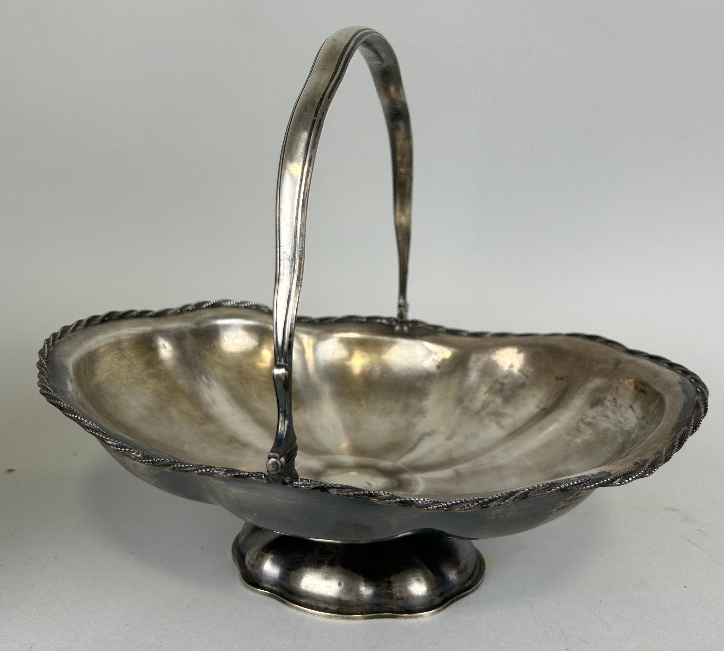 A FOREIGN SILVER BASKET, Stamped 84. Weight 611gms 29cm x 23cm x 11cm