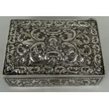 A FOREIGN 800 SOLID SILVER BOX, Repousse design with flowers, Weight 481gms 15cm x 10cm x 5cm