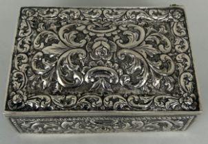 A FOREIGN 800 SOLID SILVER BOX, Repousse design with flowers, Weight 481gms 15cm x 10cm x 5cm