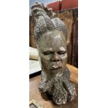 AN AFRICAN HARDSTONE SCULPTURE OF A LADY'S HEAD, 37cm H