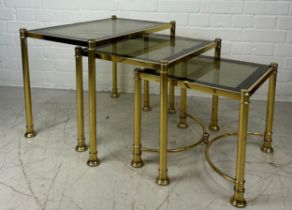 A NEST OF THREE BRASS TABLES WITH GLASS INSERTS, Largest 58cm x 38cm x 45cm