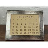 A TIFFANY AND CO SILVER PERPETUAL CALENDAR, 9.5cm x 7cm