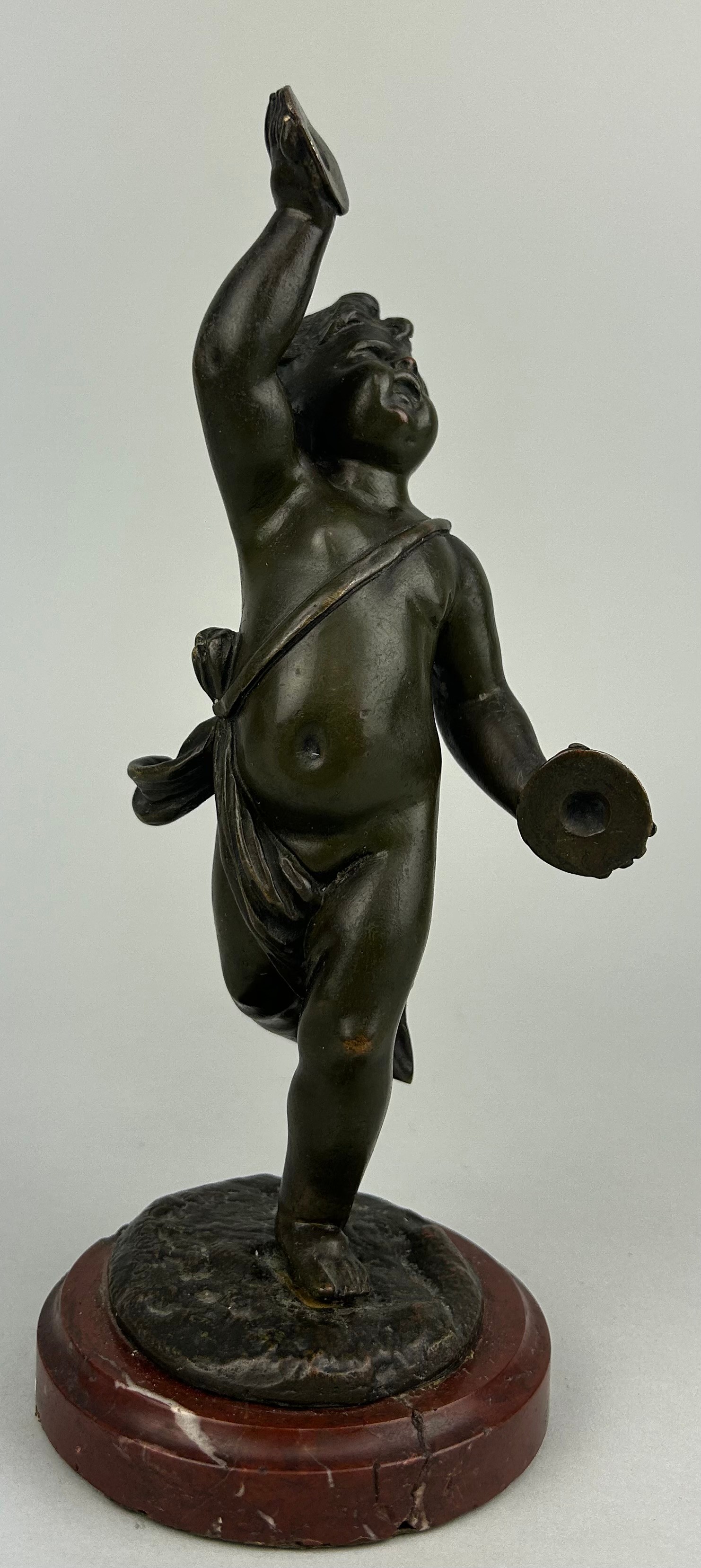 A 19TH CENTURY FRENCH BRONZE SCULPTURE OF A PUTTI AFTER CLAUDE CLODION (1738-1814) ON A RED MARBLE - Image 5 of 5