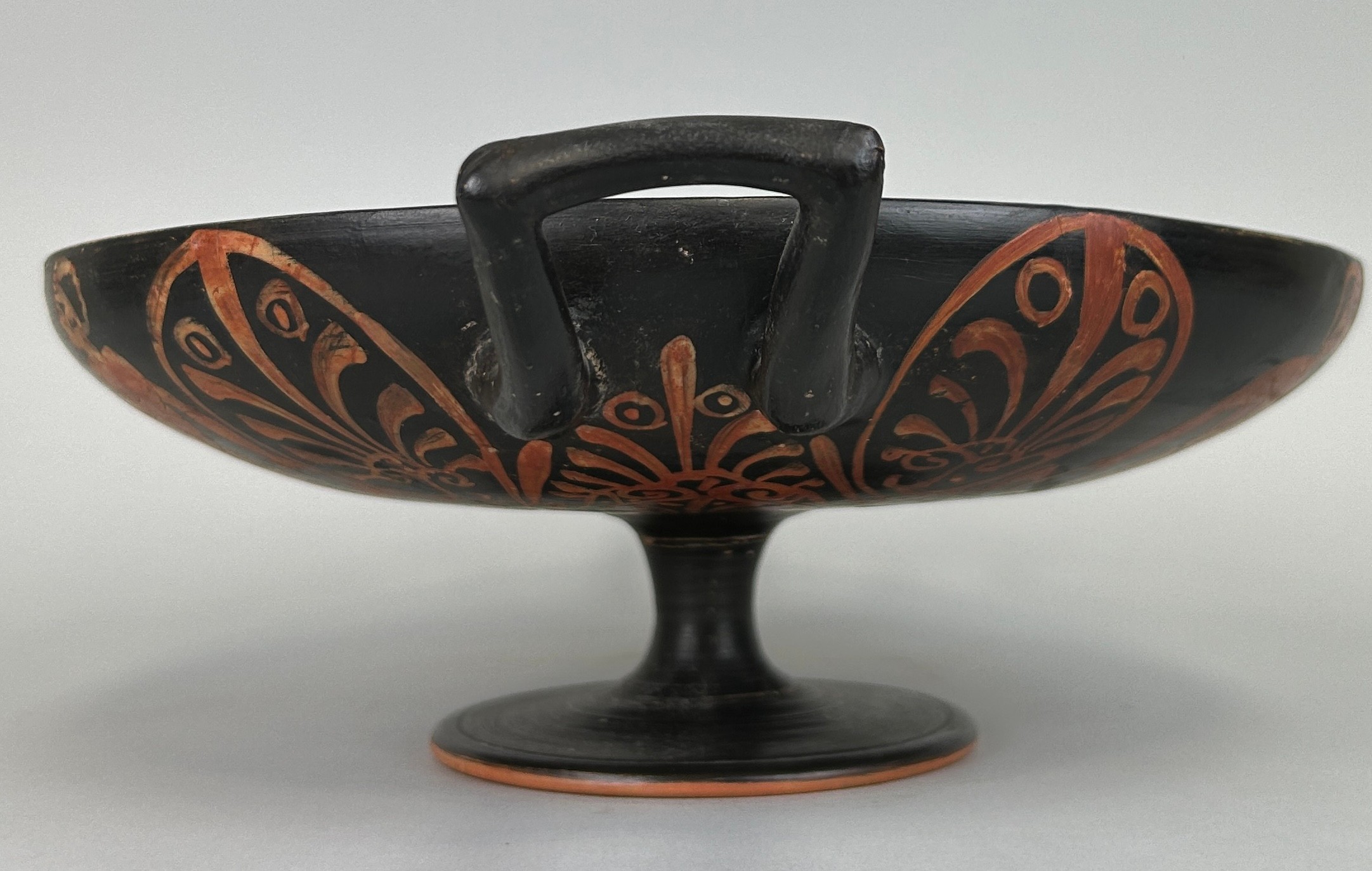 AN APULIAN POTTERY KYLIX DECORATED WITH A HORSE AND RIDER CIRCA 5TH CENTURY B.C. - Image 6 of 10
