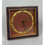 AN ART DECO 1920'S TRAVEL CLOCK WITH GREEK KEY BORDER AND ENGINE TURNED MAUVE DIAL, In running