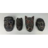 A GROUP OF FOUR AFRICAN TRIBAL MASKS (4), Largest 27cm x 14cm