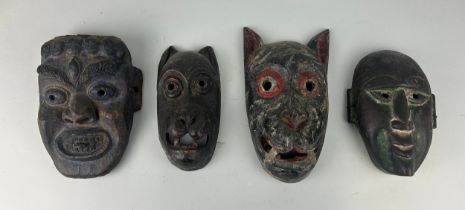 A GROUP OF FOUR AFRICAN TRIBAL MASKS (4), Largest 27cm x 14cm
