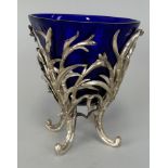 A SILVER PLATED SWEET MEAT DISH WITH BLUE GLASS INSERT, 12cm H
