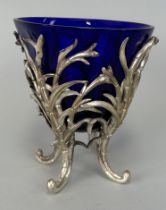 A SILVER PLATED SWEET MEAT DISH WITH BLUE GLASS INSERT, 12cm H