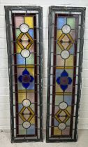 A PAIR OF STAINED GLASS PANELS FROM A LOCAL WIMBLEDON PROPERTY, 100cm x 25cm each.