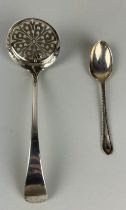 A SILVER STRAINER AND TEA SPOON, Weight: 61gms