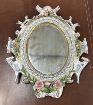 A SMALL DRESDEN PORCELAIN MIRROR AFTER MEISSEN, 34cm x 27cm