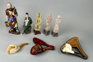 A GROUP OF FIVE CHINESE FIGURES AND THREE AMBER PIPES (8)
