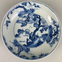 A CHINESE BLUE AND WHITE PLATE POSSIBLY KANGXI PERIOD, Six character Chenghua mark to verso. 19cm D