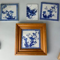 A GROUP OF FOUR CHINESE BLUE AND WHITE CERAMIC TILES, Largest 15cm x 15cm