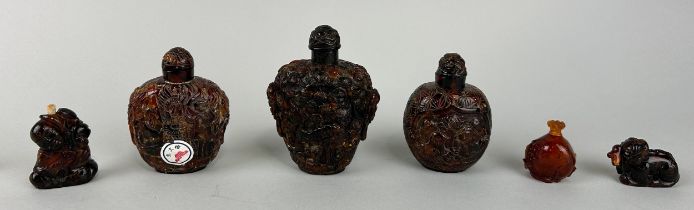 A COLLECTION OF SIX CHINESE AMBER SNUFF BOTTLES, Tallest 10cm H Three with certificates.