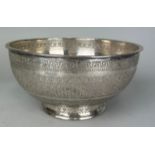 A PERSIAN SILVERED COPPER BOWL CHASED WITH FISH MOTIF, 20cm x 10cm Possibly 19th Century.