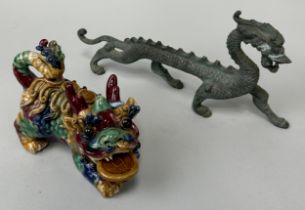A CHINESE BRONZE DRAGON ALONG WITH A CERAMIC EXAMPLE (2), Bronze 32cm L