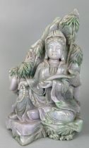 A CHINESE JADE SCULPTURE DEPICTING THE SEATED GUANYIN, 29cm x 20cm