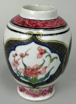 A CHINESE WHITE AND PINK VASE DECORATED WITH FLOWERS, Possibly Yongzheng period. 11cm H