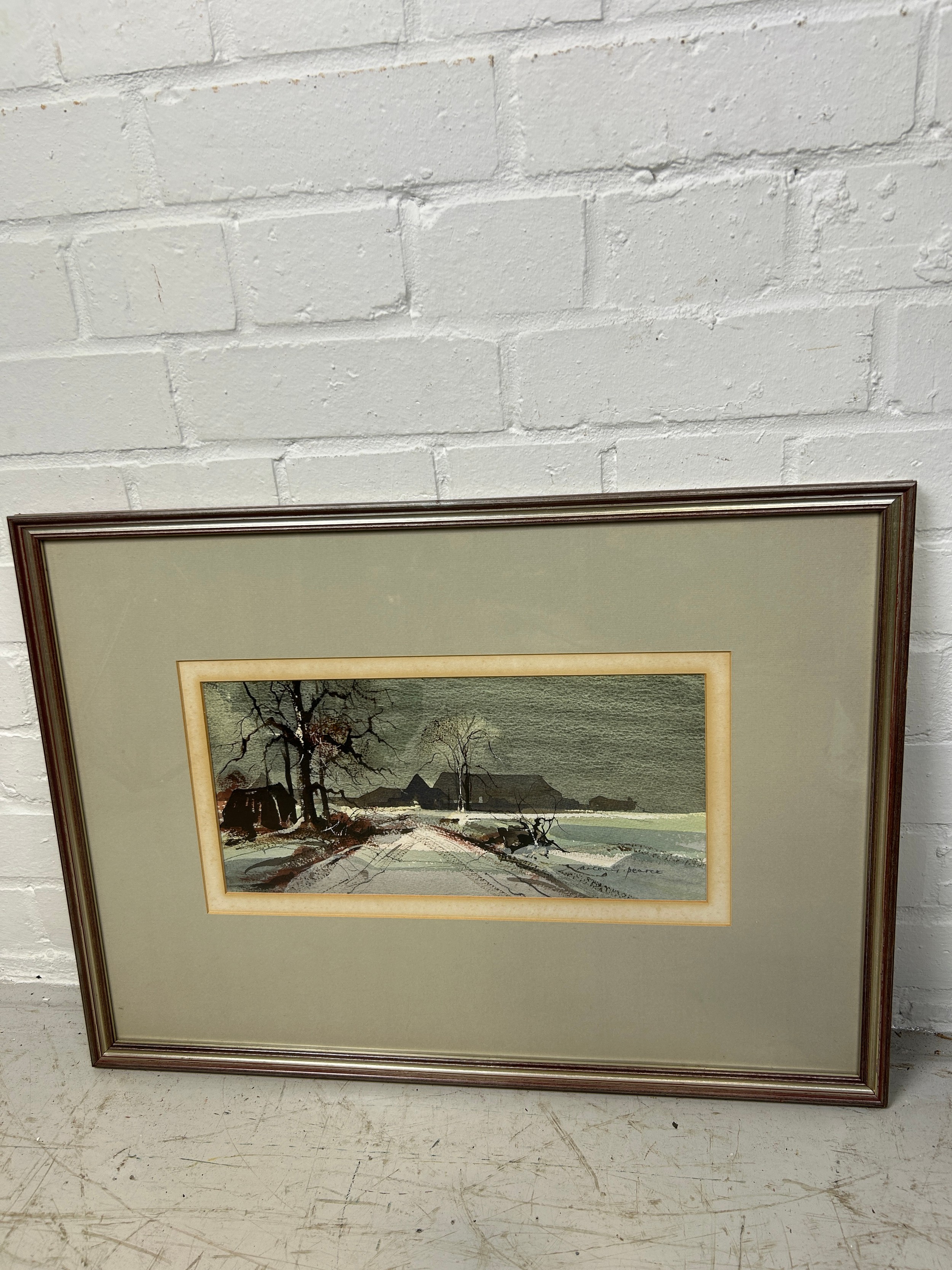 ANTONY PEARCE (B.1933): A WATERCOLOUR PAINTING ON PAPER DEPICTING A WINTRY LANDSCAPE SCENE, - Image 2 of 2
