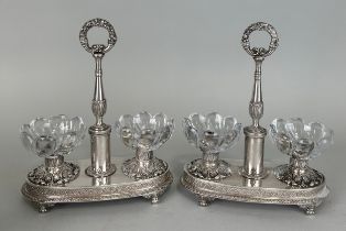 A PAIR OF 19TH CENTURY FRENCH SILVER SALERONS WITH CRYSTAL CUPS MARKED FOR LOUIS-ISIDORE ANGEE, 21cm