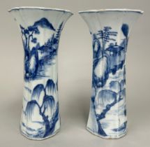 A PAIR OF 18TH CENTURY CHINESE BLUE AND WHITE VASES, 20cm H each.