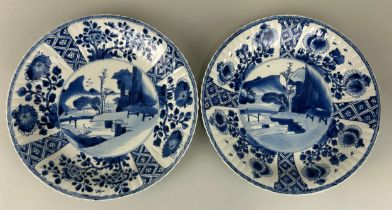 A PAIR OF CHINESE BLUE AND WHITE KANGXI PERIOD PLATES, Leaf mark to verso. 26cm D each.