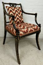 A REGENCY PERIOD EMPIRE ARMCHAIR, With lyriform splat, gilt top rail, arms and legs, patterned